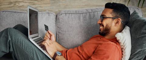 Man paying online with a card